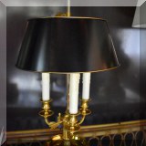 DL04. Three-light brass table lamp. 